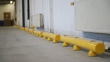 Kunststof doorrijbeveiliging ø100 mm. -2500mm.x155mm. brede voetplaat