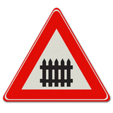 Verkehrszeichen J10 - Warnung zum Überqueren von Barrieren
